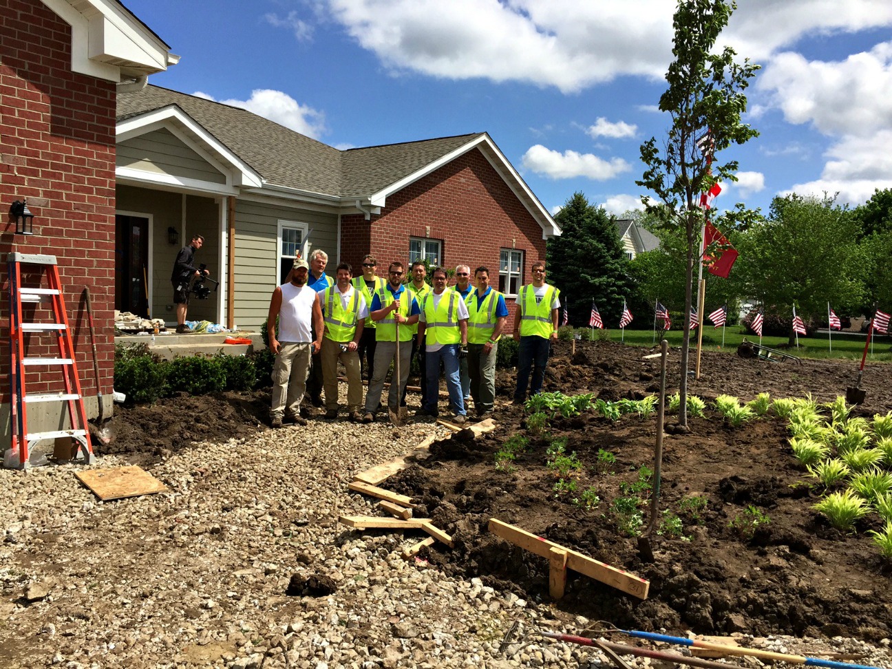 Team Members Rally to Install Landscaping for Decorated U.S. Army
